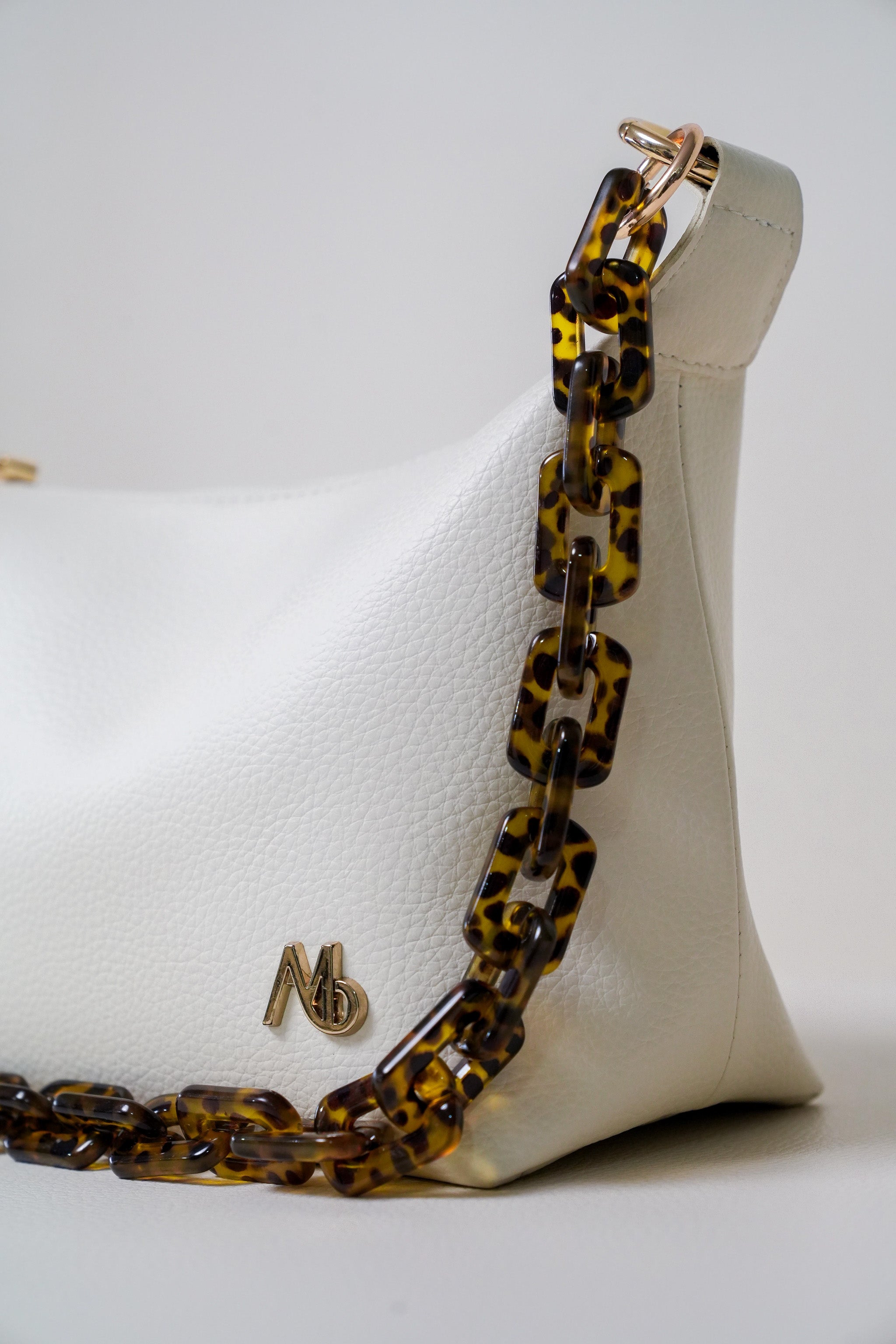Manija Cadena Cow Print